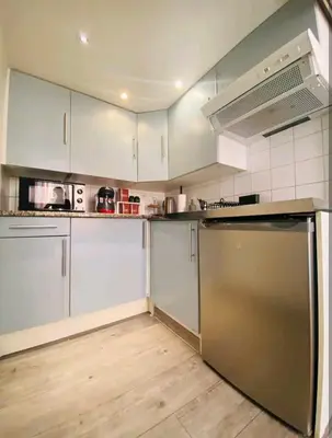 Cuisine ou kitchenette dans l'établissement La Parenthèse Enchantée - Belfort Centre proche gare - Fibre Netflix