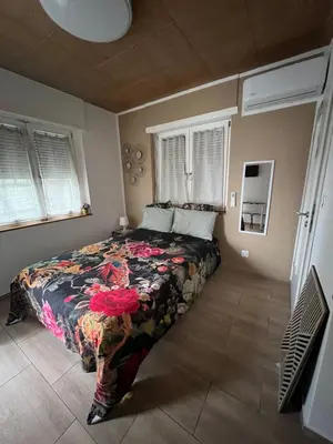 Un ou plusieurs lits dans un hébergement de l'établissement Maison letiluca