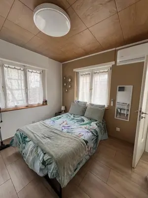 Un ou plusieurs lits dans un hébergement de l'établissement Maison letiluca