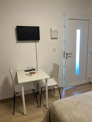 Télévision ou salle de divertissement dans l'établissement Maison letiluca