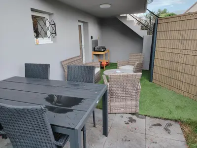 Terrasse ou espace extérieur de l'établissement Gîte le petit wintz 4 personnes avec son jardin privatif - Parking avec borne de recharge pour véhicule électrique 22Kw - 2 vélos
