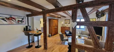 Coin salon dans l'établissement Gîte Du XVe