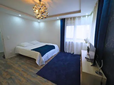 Un ou plusieurs lits dans un hébergement de l'établissement La Marine by Leslodgespa - Appartement moderne et équipé au style marin, proche de Bâle et de l'aéroport