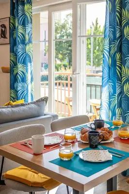 Coin salon dans l'établissement Le 24-GregIMMO-Appart'Hôtel