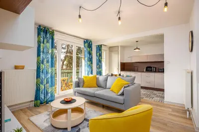 Coin salon dans l'établissement Le 24-GregIMMO-Appart'Hôtel