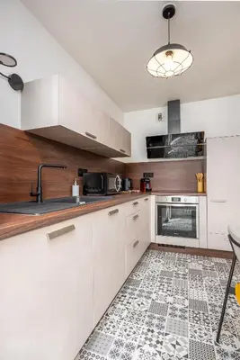 Cuisine ou kitchenette dans l'établissement Le 24-GregIMMO-Appart'Hôtel