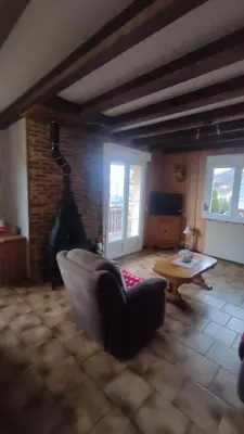 Coin salon dans l'établissement Maison de montagne avec vue panoramique