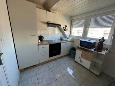 Cuisine ou kitchenette dans l'établissement Duplex F2 - proche GARE TGV