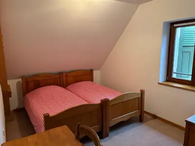 Un ou plusieurs lits dans un hébergement de l'établissement Auberge du Graber