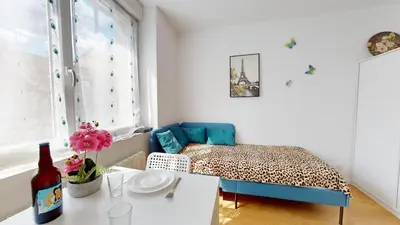 Un ou plusieurs lits dans un hébergement de l'établissement Le Charme Colmarien - Appartement 2 pièces au cœur de la ville