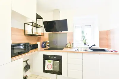 Cuisine ou kitchenette dans l'établissement Evasion Mulhousienne