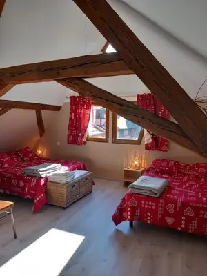 Un ou plusieurs lits dans un hébergement de l'établissement Gite Schlossberg