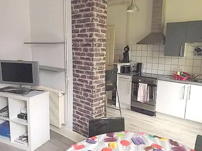 Cuisine ou kitchenette dans l'établissement Agréable F3 - RDC (2 chambres)