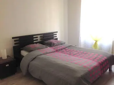 Un ou plusieurs lits dans un hébergement de l'établissement Agréable F3 - RDC (2 chambres)