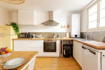 Cuisine ou kitchenette dans l'établissement Gite See You Soon - Maison de ville Roots