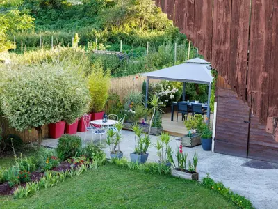 Jardin de l'établissement Gîte alsacien rénové avec jardin près de la Suisse et de l'Allemagne, idéal pour familles et amis - FR-1-744-29