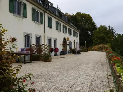 Jardin de l'établissement Maison familiale à Orbey, 3 chambres, parking privé, espace vert, jeux pour enfants - FR-1-744-26