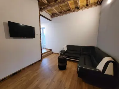 Télévision ou salle de divertissement dans l'établissement Gîte de la Ferme de la Comté