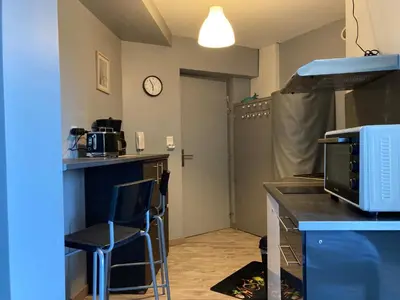 Cuisine ou kitchenette dans l'établissement LE CONTI