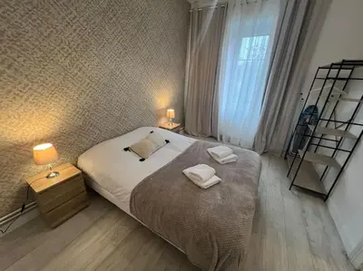 Un ou plusieurs lits dans un hébergement de l'établissement Esprit Colmar - 2 chambres de charme