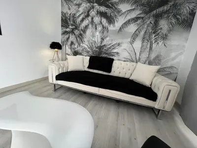 Coin salon dans l'établissement Le Cannois, Appartement de star 3 chambres