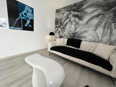 Coin salon dans l'établissement Le Cannois, Appartement de star 3 chambres