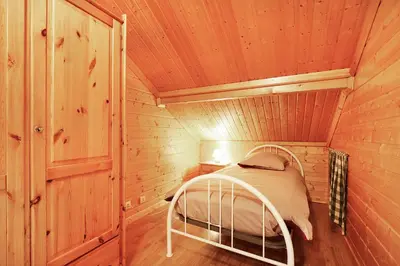Un ou plusieurs lits dans un hébergement de l'établissement Le Chalet des Cœurs - Avec vue montagne