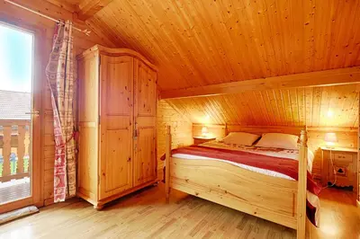 Un ou plusieurs lits dans un hébergement de l'établissement Le Chalet des Cœurs - Avec vue montagne