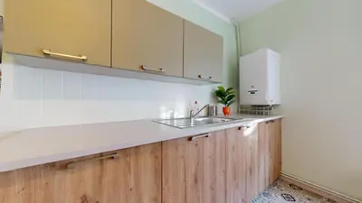 Cuisine ou kitchenette dans l'établissement Le Petit Chez Vous