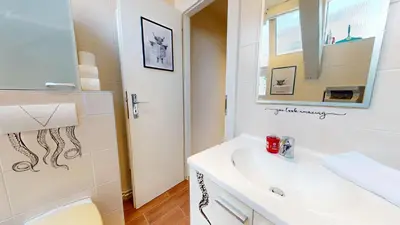Salle de bains dans l'établissement Le Petit Chez Vous