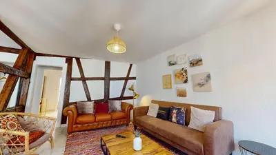 Coin salon dans l'établissement Le Petit Chez Vous