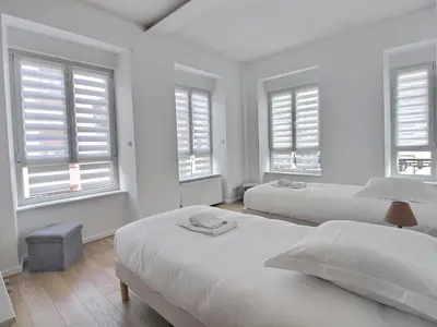 Un ou plusieurs lits dans un hébergement de l'établissement Maison de caractère avec jacuzzi et parking à deux pas du centre historique de Colmar - FR-1-722-3