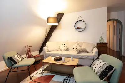 Coin salon dans l'établissement La Loge by 
