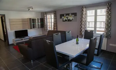 Télévision ou salle de divertissement dans l'établissement Appartements Le Hupsa Pfannala