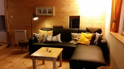 Coin salon dans l'établissement Giteovosges