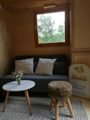 Coin salon dans l'établissement Giteovosges