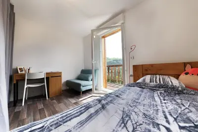Un ou plusieurs lits dans un hébergement de l'établissement La Bergerie du Pré de l'Orme - Avec vue montagne