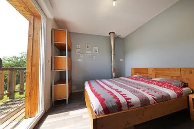 Un ou plusieurs lits dans un hébergement de l'établissement La Bergerie du Pré de l'Orme - Avec vue montagne