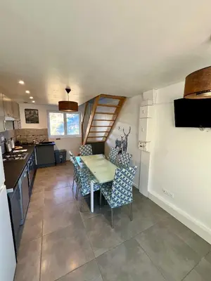 Cuisine ou kitchenette dans l'établissement Grand apt La Bresse 6 a 8 pers centre et pistes proches