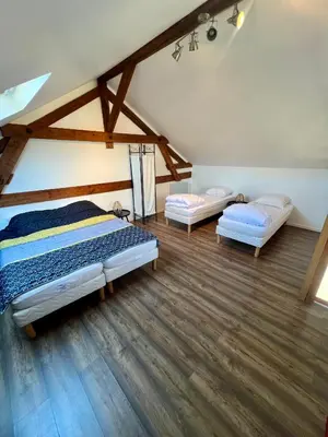 Un ou plusieurs lits dans un hébergement de l'établissement Grand apt La Bresse 6 a 8 pers centre et pistes proches
