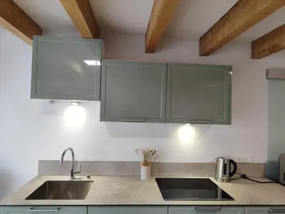 Cuisine ou kitchenette dans l'établissement Gîte indépendant au calme 