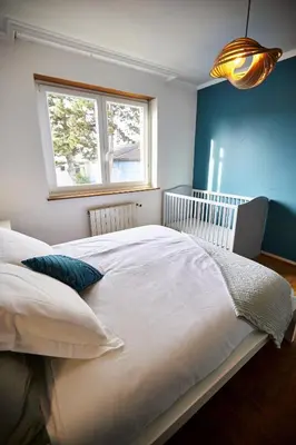 Un ou plusieurs lits dans un hébergement de l'établissement Maison 140m2 au calme - Beau jardin - à 15mn à pied du Centre-ville de COLMAR