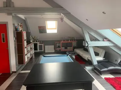 Télévision ou salle de divertissement dans l'établissement Appartement moderne