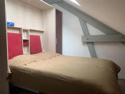 Un ou plusieurs lits dans un hébergement de l'établissement Appartement moderne