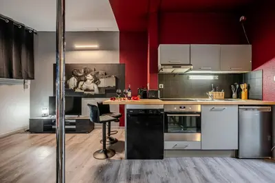 Cuisine ou kitchenette dans l'établissement Cocon Sensuel - 50 Nuances - Les Cocons de Nath