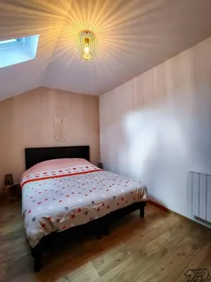 Un ou plusieurs lits dans un hébergement de l'établissement Gite de la Ravanne/Le petit nid