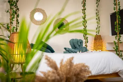 Un ou plusieurs lits dans un hébergement de l'établissement Gîte-Spa Nature