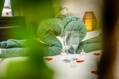 Un ou plusieurs lits dans un hébergement de l'établissement Gîte-Spa Nature