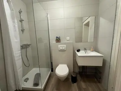 Salle de bains dans l'établissement Le Petit Café - Centre ville, parking gratuit