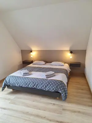 Un ou plusieurs lits dans un hébergement de l'établissement Maison individuelle, 10 minutes de Colmar 4 chambres - 8 personnes - 2 sdb